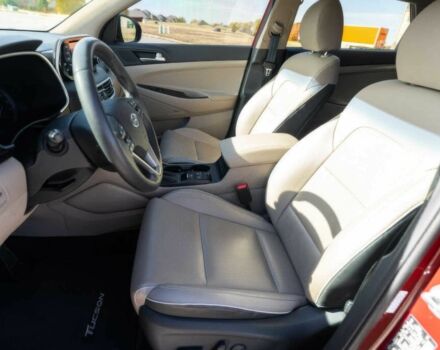 Красный Хендай Туксон, объемом двигателя 2 л и пробегом 45 тыс. км за 14000 $, фото 15 на Automoto.ua