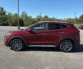 Красный Хендай Туксон, объемом двигателя 2.4 л и пробегом 38 тыс. км за 11300 $, фото 3 на Automoto.ua