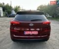 Красный Хендай Туксон, объемом двигателя 2 л и пробегом 119 тыс. км за 15500 $, фото 11 на Automoto.ua