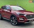 Красный Хендай Туксон, объемом двигателя 2 л и пробегом 64 тыс. км за 30500 $, фото 1 на Automoto.ua