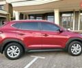 Красный Хендай Туксон, объемом двигателя 2 л и пробегом 94 тыс. км за 19500 $, фото 3 на Automoto.ua
