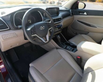 Красный Хендай Туксон, объемом двигателя 2 л и пробегом 45 тыс. км за 14000 $, фото 7 на Automoto.ua