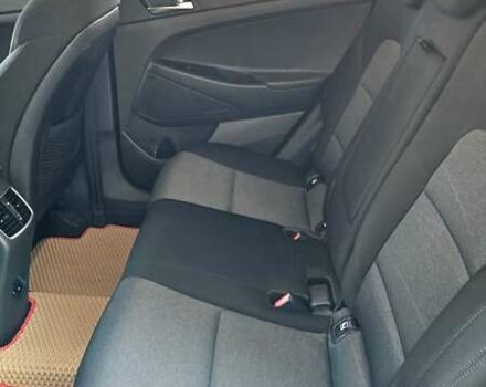 Красный Хендай Туксон, объемом двигателя 2 л и пробегом 94 тыс. км за 19500 $, фото 23 на Automoto.ua