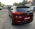 Красный Хендай Туксон, объемом двигателя 2 л и пробегом 119 тыс. км за 15500 $, фото 9 на Automoto.ua