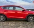 Красный Хендай Туксон, объемом двигателя 2 л и пробегом 68 тыс. км за 22000 $, фото 5 на Automoto.ua