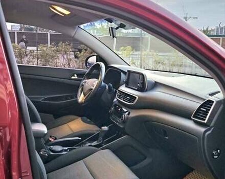 Красный Хендай Туксон, объемом двигателя 2 л и пробегом 94 тыс. км за 19500 $, фото 27 на Automoto.ua