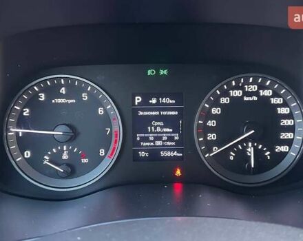 Красный Хендай Туксон, объемом двигателя 2 л и пробегом 68 тыс. км за 22000 $, фото 13 на Automoto.ua