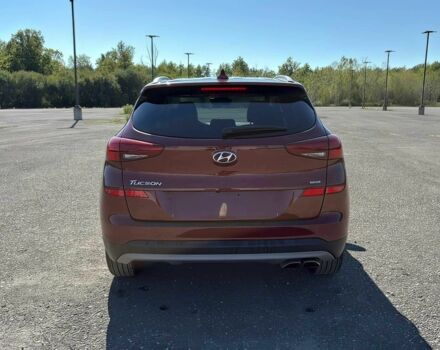 Красный Хендай Туксон, объемом двигателя 2.4 л и пробегом 38 тыс. км за 11300 $, фото 5 на Automoto.ua