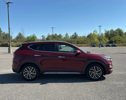 Красный Хендай Туксон, объемом двигателя 2.4 л и пробегом 38 тыс. км за 11300 $, фото 7 на Automoto.ua