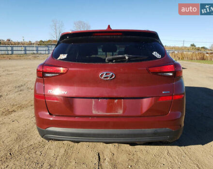 Красный Хендай Туксон, объемом двигателя 2 л и пробегом 71 тыс. км за 13300 $, фото 5 на Automoto.ua