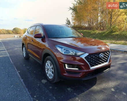 Красный Хендай Туксон, объемом двигателя 2 л и пробегом 97 тыс. км за 20000 $, фото 2 на Automoto.ua