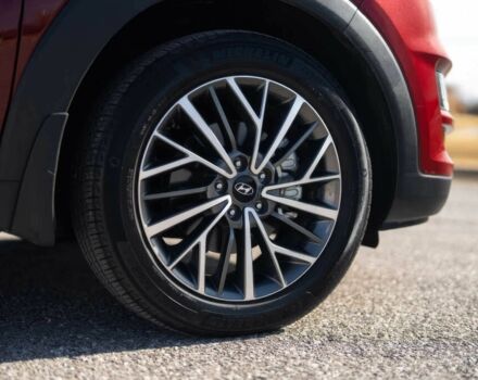 Красный Хендай Туксон, объемом двигателя 2 л и пробегом 45 тыс. км за 14000 $, фото 22 на Automoto.ua