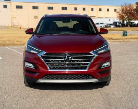 Красный Хендай Туксон, объемом двигателя 2 л и пробегом 45 тыс. км за 14000 $, фото 1 на Automoto.ua