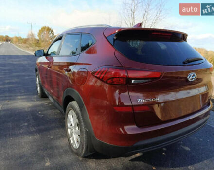 Красный Хендай Туксон, объемом двигателя 2 л и пробегом 97 тыс. км за 20000 $, фото 6 на Automoto.ua