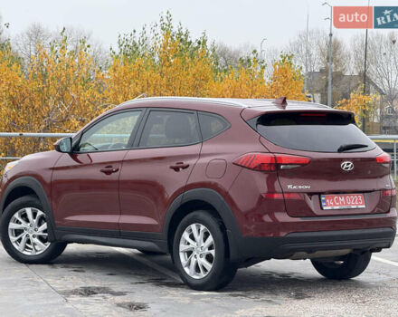 Красный Хендай Туксон, объемом двигателя 0 л и пробегом 175 тыс. км за 19900 $, фото 7 на Automoto.ua