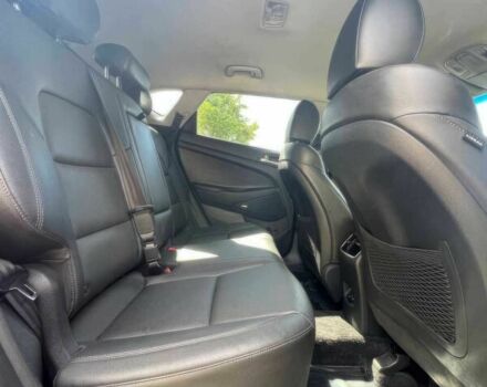 Червоний Хендай Туксон, об'ємом двигуна 2.4 л та пробігом 46 тис. км за 6400 $, фото 10 на Automoto.ua