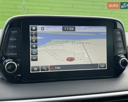 Красный Хендай Туксон, объемом двигателя 2 л и пробегом 64 тыс. км за 30500 $, фото 24 на Automoto.ua