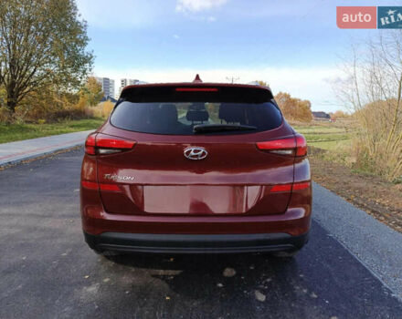 Красный Хендай Туксон, объемом двигателя 2 л и пробегом 97 тыс. км за 20000 $, фото 5 на Automoto.ua