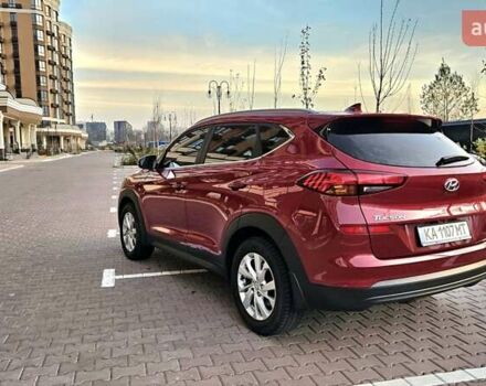 Красный Хендай Туксон, объемом двигателя 2 л и пробегом 94 тыс. км за 19500 $, фото 7 на Automoto.ua