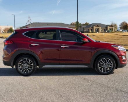 Красный Хендай Туксон, объемом двигателя 2 л и пробегом 45 тыс. км за 14000 $, фото 6 на Automoto.ua