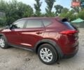 Красный Хендай Туксон, объемом двигателя 2 л и пробегом 119 тыс. км за 15500 $, фото 3 на Automoto.ua