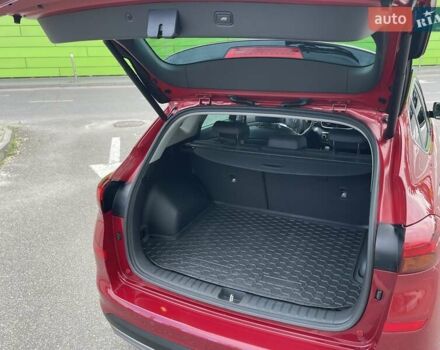 Красный Хендай Туксон, объемом двигателя 2 л и пробегом 64 тыс. км за 30500 $, фото 8 на Automoto.ua