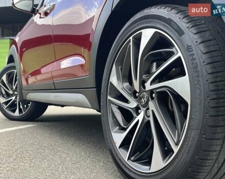 Красный Хендай Туксон, объемом двигателя 2 л и пробегом 64 тыс. км за 30500 $, фото 11 на Automoto.ua