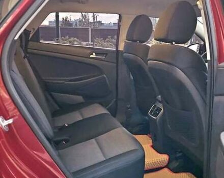 Красный Хендай Туксон, объемом двигателя 2 л и пробегом 94 тыс. км за 19500 $, фото 25 на Automoto.ua