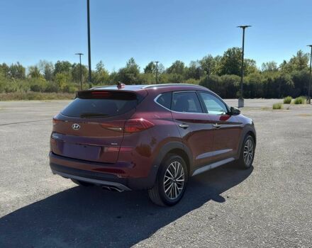 Красный Хендай Туксон, объемом двигателя 2.4 л и пробегом 38 тыс. км за 11300 $, фото 4 на Automoto.ua