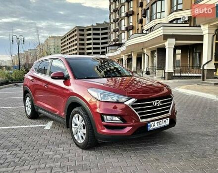 Красный Хендай Туксон, объемом двигателя 2 л и пробегом 94 тыс. км за 19500 $, фото 8 на Automoto.ua