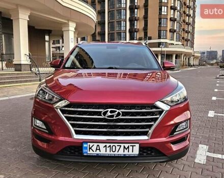 Красный Хендай Туксон, объемом двигателя 2 л и пробегом 94 тыс. км за 19500 $, фото 1 на Automoto.ua