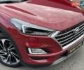 Красный Хендай Туксон, объемом двигателя 2 л и пробегом 64 тыс. км за 30500 $, фото 3 на Automoto.ua