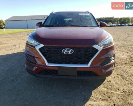 Красный Хендай Туксон, объемом двигателя 2 л и пробегом 71 тыс. км за 13300 $, фото 4 на Automoto.ua
