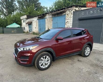 Красный Хендай Туксон, объемом двигателя 2 л и пробегом 119 тыс. км за 15500 $, фото 5 на Automoto.ua