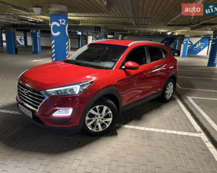 Красный Хендай Туксон, объемом двигателя 2 л и пробегом 95 тыс. км за 21500 $, фото 6 на Automoto.ua