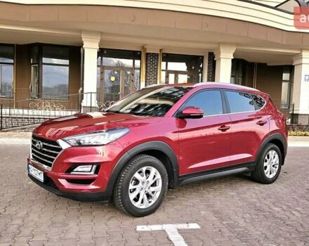 Красный Хендай Туксон, объемом двигателя 2 л и пробегом 94 тыс. км за 19500 $, фото 2 на Automoto.ua