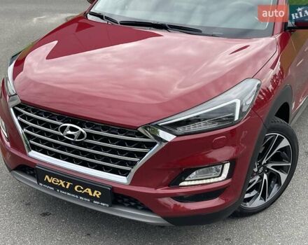 Красный Хендай Туксон, объемом двигателя 2 л и пробегом 64 тыс. км за 30500 $, фото 2 на Automoto.ua