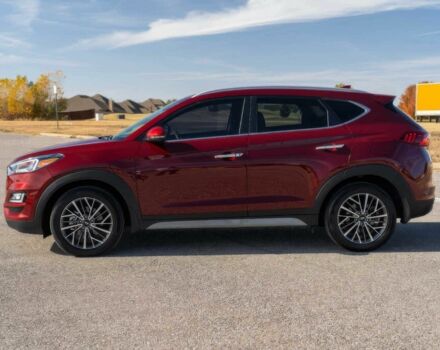 Красный Хендай Туксон, объемом двигателя 2 л и пробегом 45 тыс. км за 14000 $, фото 2 на Automoto.ua