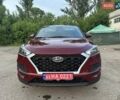 Красный Хендай Туксон, объемом двигателя 2 л и пробегом 119 тыс. км за 15500 $, фото 12 на Automoto.ua