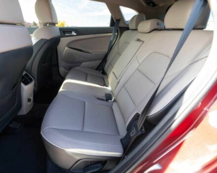 Красный Хендай Туксон, объемом двигателя 2 л и пробегом 45 тыс. км за 14000 $, фото 20 на Automoto.ua