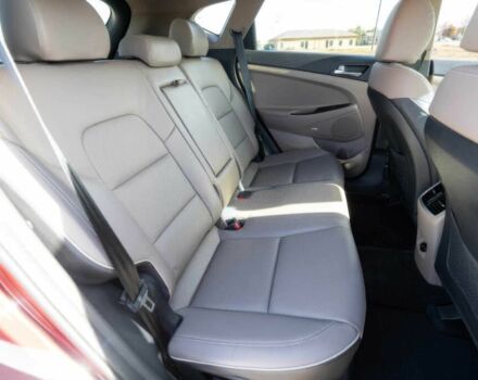 Красный Хендай Туксон, объемом двигателя 2 л и пробегом 45 тыс. км за 14000 $, фото 19 на Automoto.ua