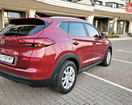 Красный Хендай Туксон, объемом двигателя 2 л и пробегом 94 тыс. км за 19500 $, фото 9 на Automoto.ua