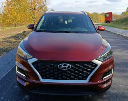 Красный Хендай Туксон, объемом двигателя 2 л и пробегом 97 тыс. км за 20000 $, фото 1 на Automoto.ua