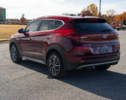 Красный Хендай Туксон, объемом двигателя 2 л и пробегом 45 тыс. км за 14000 $, фото 3 на Automoto.ua