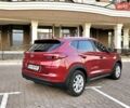 Красный Хендай Туксон, объемом двигателя 2 л и пробегом 94 тыс. км за 19500 $, фото 4 на Automoto.ua