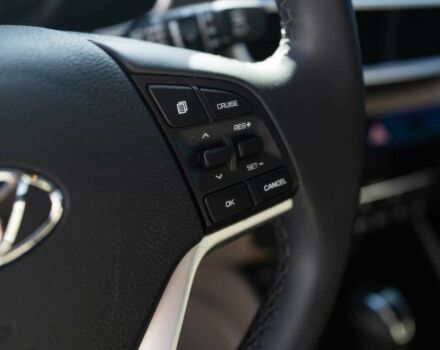 Красный Хендай Туксон, объемом двигателя 2 л и пробегом 45 тыс. км за 14000 $, фото 9 на Automoto.ua