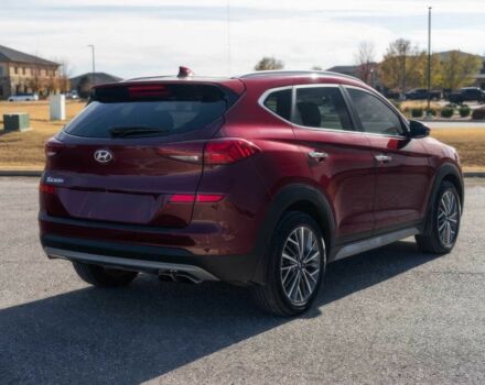 Красный Хендай Туксон, объемом двигателя 2 л и пробегом 45 тыс. км за 14000 $, фото 5 на Automoto.ua