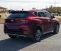 Красный Хендай Туксон, объемом двигателя 2 л и пробегом 45 тыс. км за 14000 $, фото 5 на Automoto.ua