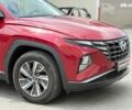 Красный Хендай Туксон, объемом двигателя 2 л и пробегом 26 тыс. км за 28990 $, фото 4 на Automoto.ua