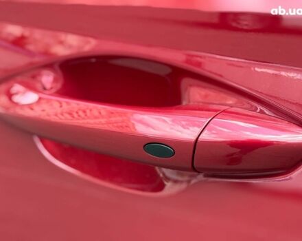 Красный Хендай Туксон, объемом двигателя 2 л и пробегом 26 тыс. км за 28990 $, фото 12 на Automoto.ua